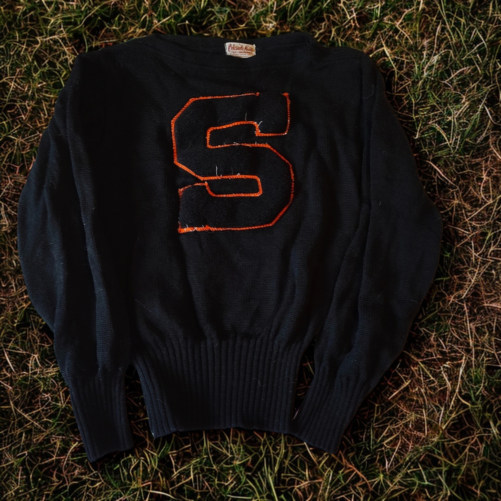 Black Sweater with Orange Lettering